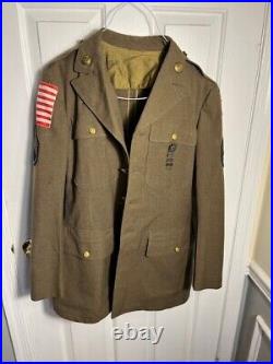 Authentic US Army WWII military jacket with patches (Dated 2-7-1940)