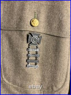 Authentic US Army WWII military jacket with patches (Dated 2-7-1940)
